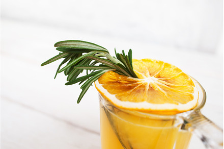 Close-up of orange juice with, a Food & Drink Photo by Photo Drive Studio