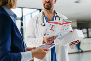 Female medical sales representative, a Business Photo by HalfPoint