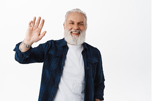 Friendly old man waving hand to say