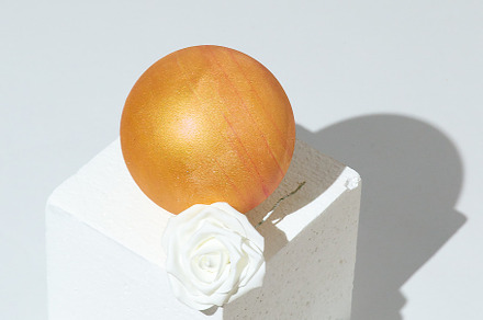 Stylish winter geometric scene white cube, gold ball and roses d, a Holiday Photo by Jenya Porechenskaya