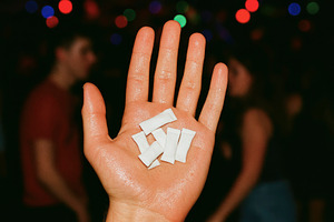 hand holding white nicotine pouches, generative AI, a Photo by Nito