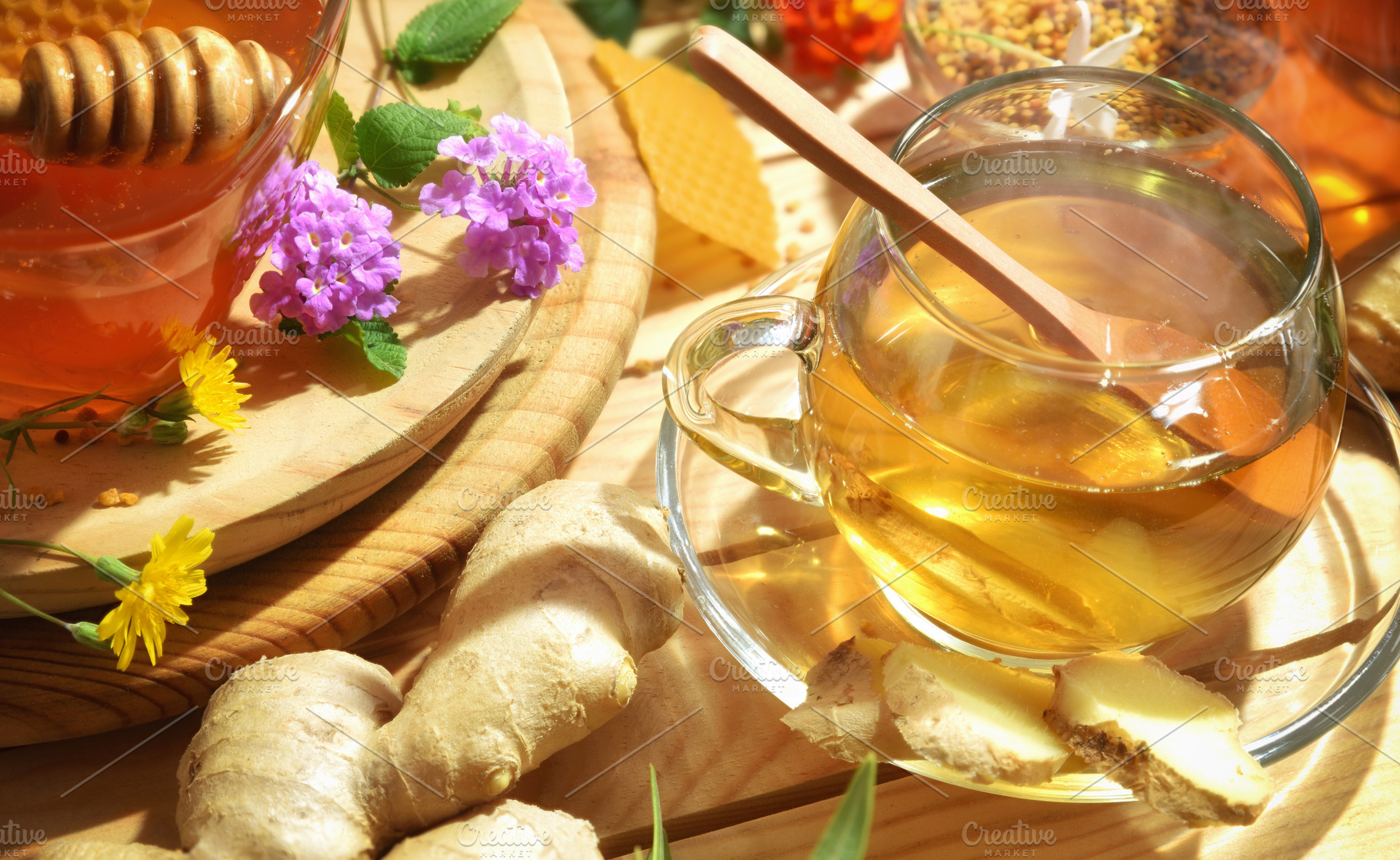 Glass cup with ginger honey and natural herbs drink, a Food & Drink Photo by Davizro's Market