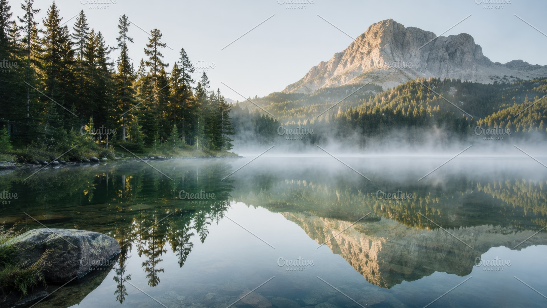 Mountain and lake reflect in morning, a Photo by Beautiful things