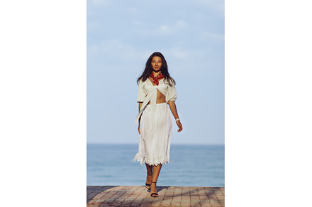 Woman in Elegant Beach Outfit, a Person Photo by Emotion photo