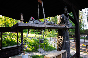 Rustic outdoor decor with farm ambiance and vintage elements on wooden surfaces, a Photo by AS photostudio