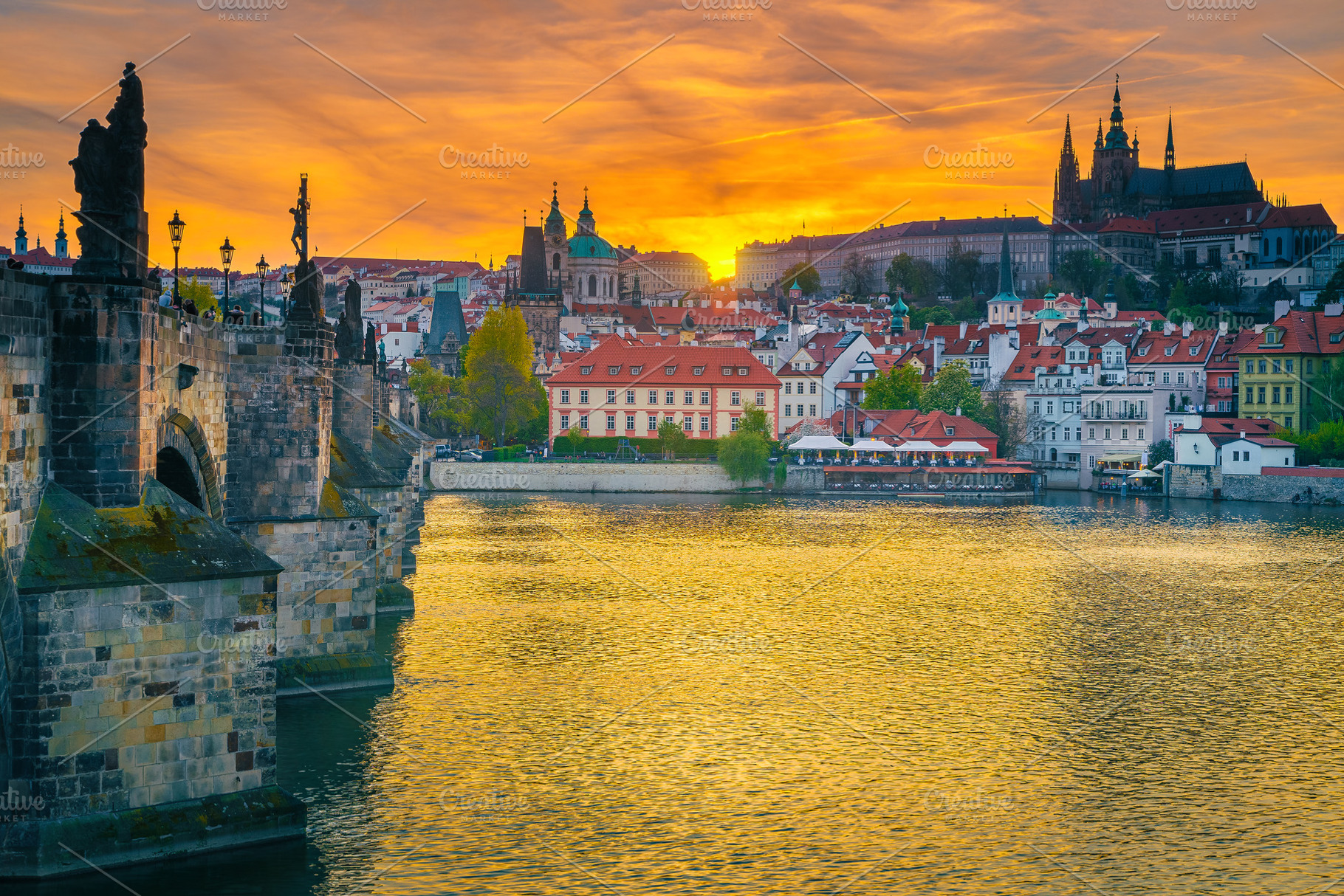 Charles bridge over the Vltava river, an Architecture Photo by Alpine Dreams