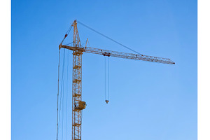 Two large cranes stand tall against