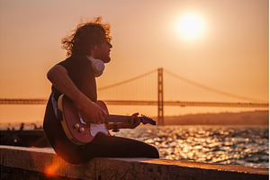Street musician playing electric