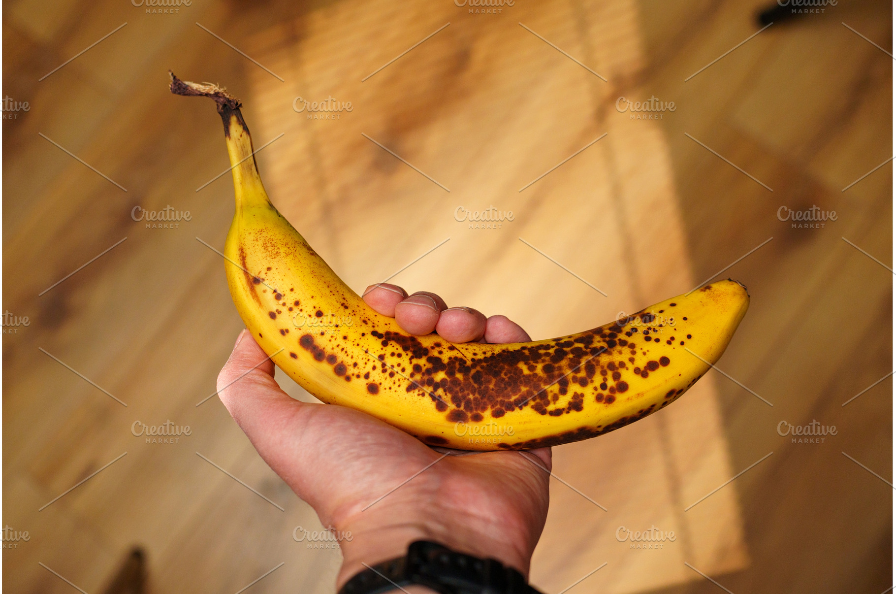 Brightly colored banana with brown, a Background Photo by darksoul72