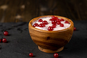 milk product with the addition of red sweet and sour currants and currant flavo, a Photo by rsoollAI