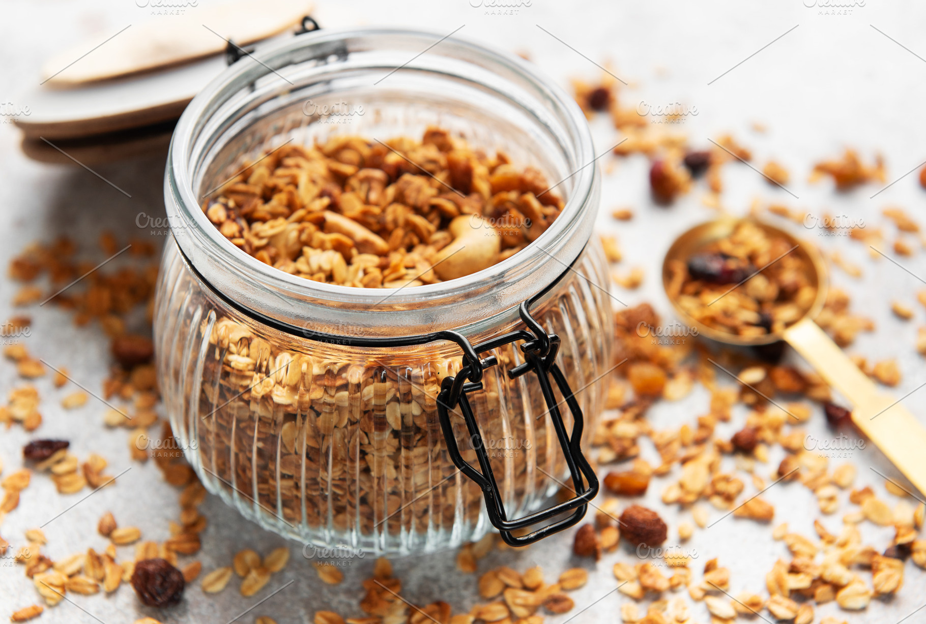 Granola with nuts and dry fruits for breakfast, a Food & Drink Photo by Olena Rudo