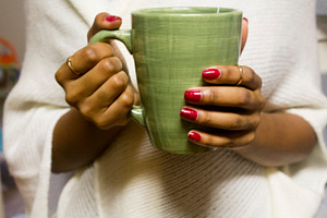 Black Woman Holding Coffee Mug