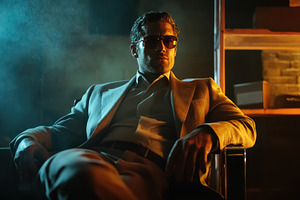 Intriguing spy in sunglasses relaxes, a Photo by Iftikhar Alam