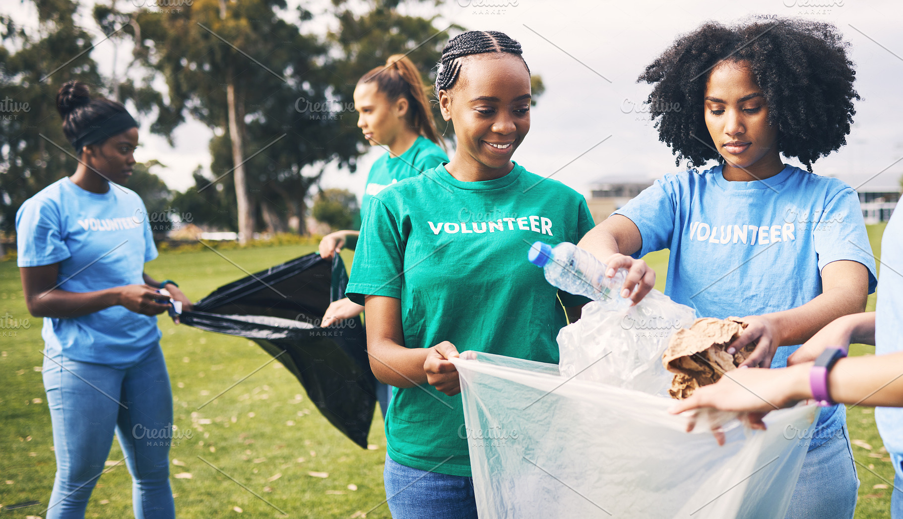 Students, recycle and community volunteer project with young people cleaning plastic and trash. Happy, recycling and charity work for a sustainability, eco friendly and ecology service outdoor, a Photo by Peopleimages.com