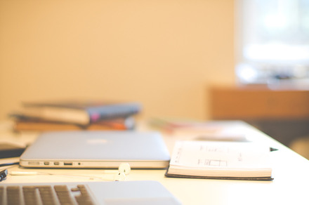 Desk containing freelancer, desk, and office