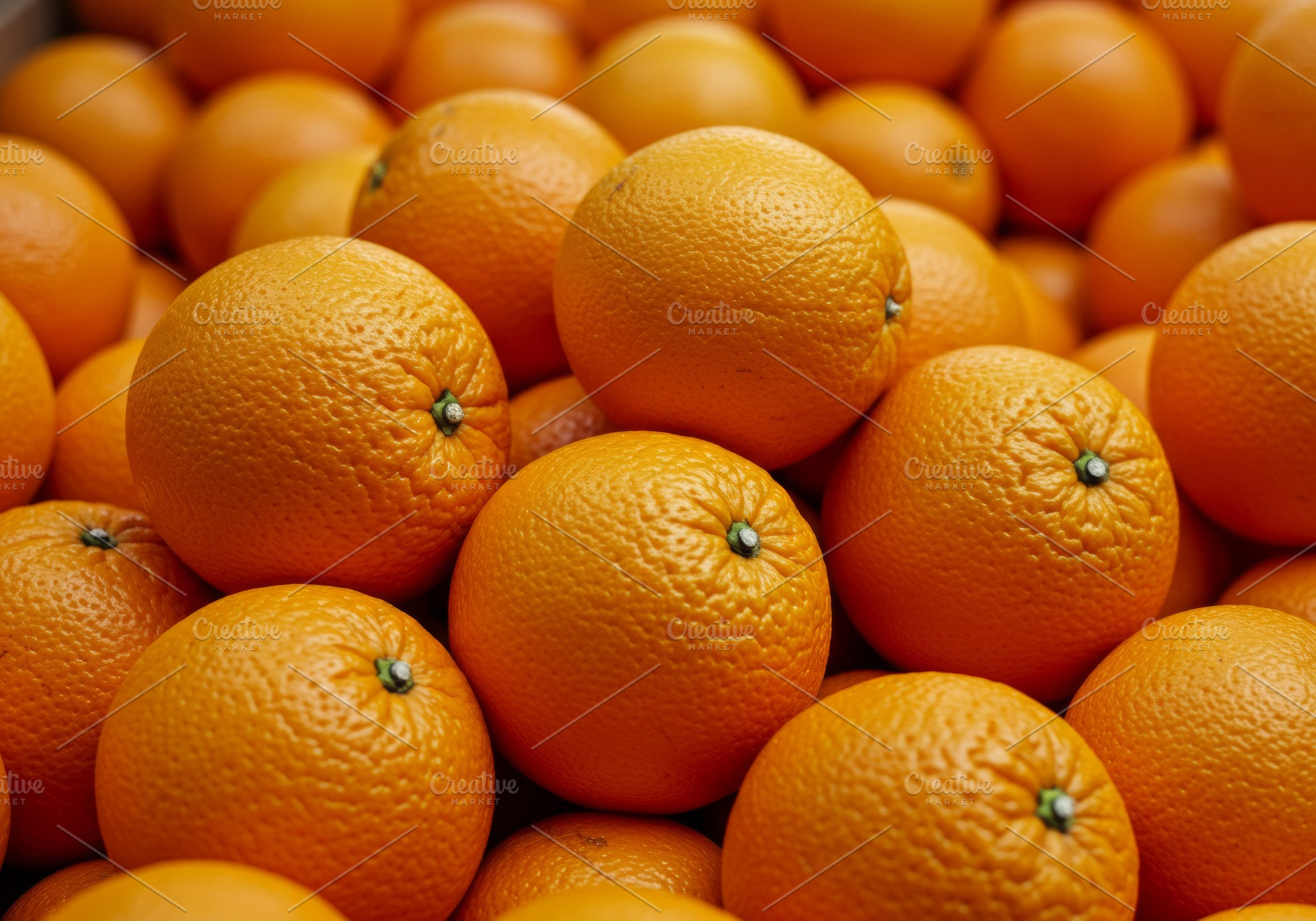 Fresh ripe oranges piled together sh, a Food & Drink Photo by professorinc