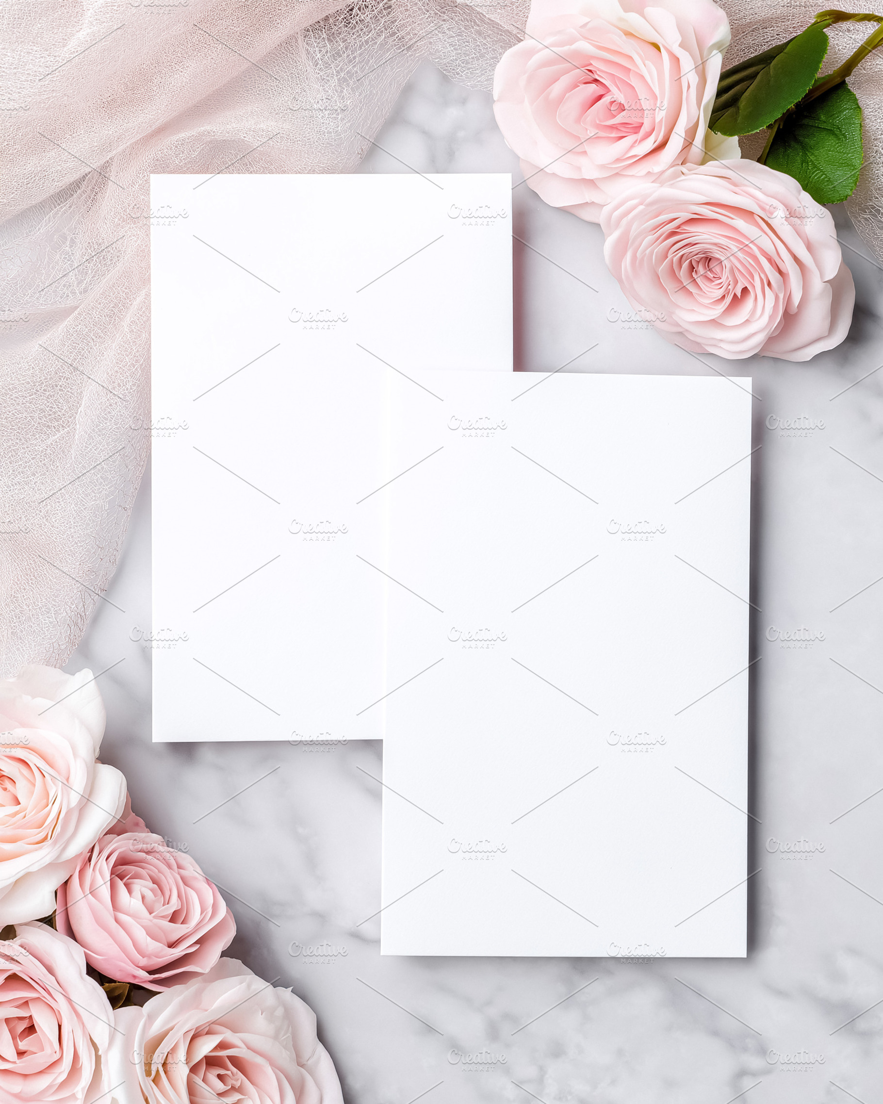 Blank vertical invitation cards mockup with delicate pink roses and sheer fabri, a Holiday Photo by Studio ANNA