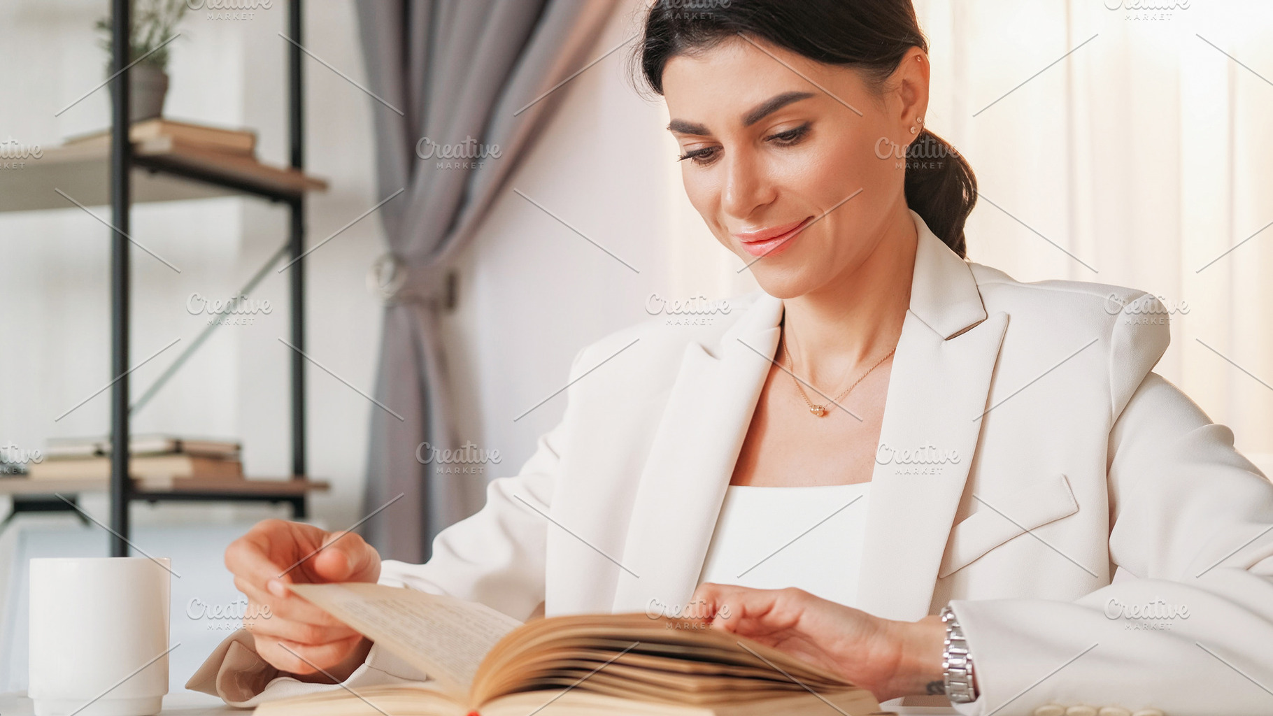 Enjoying book happy woman work break, a Person Photo by Photo Drive Studio