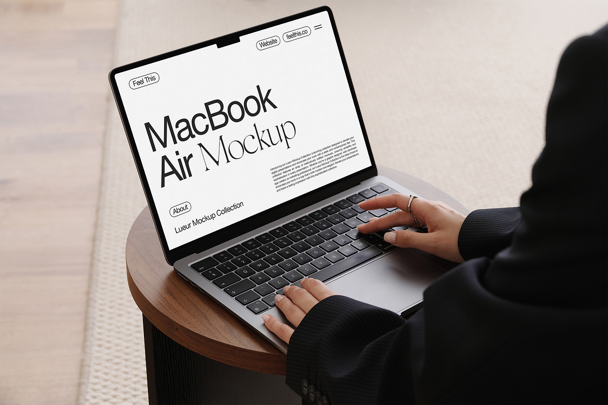 MacBook with Hands Mockup PSD, a Mac Mockup by Feel This (Photo 1 of 2)