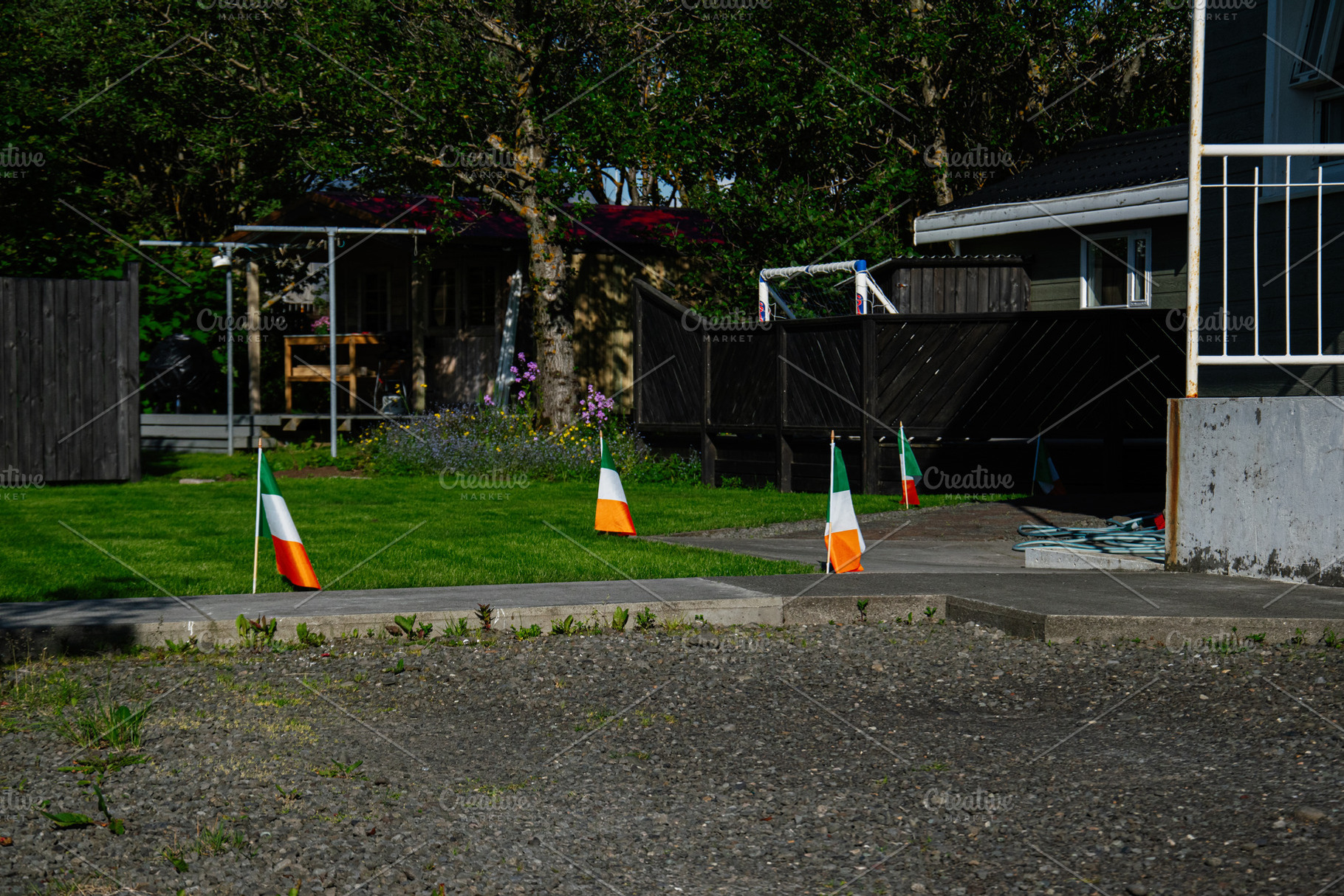 Flags representing Irish culture during a celebration in Akranes, Iceland, a Photo by AS photostudio