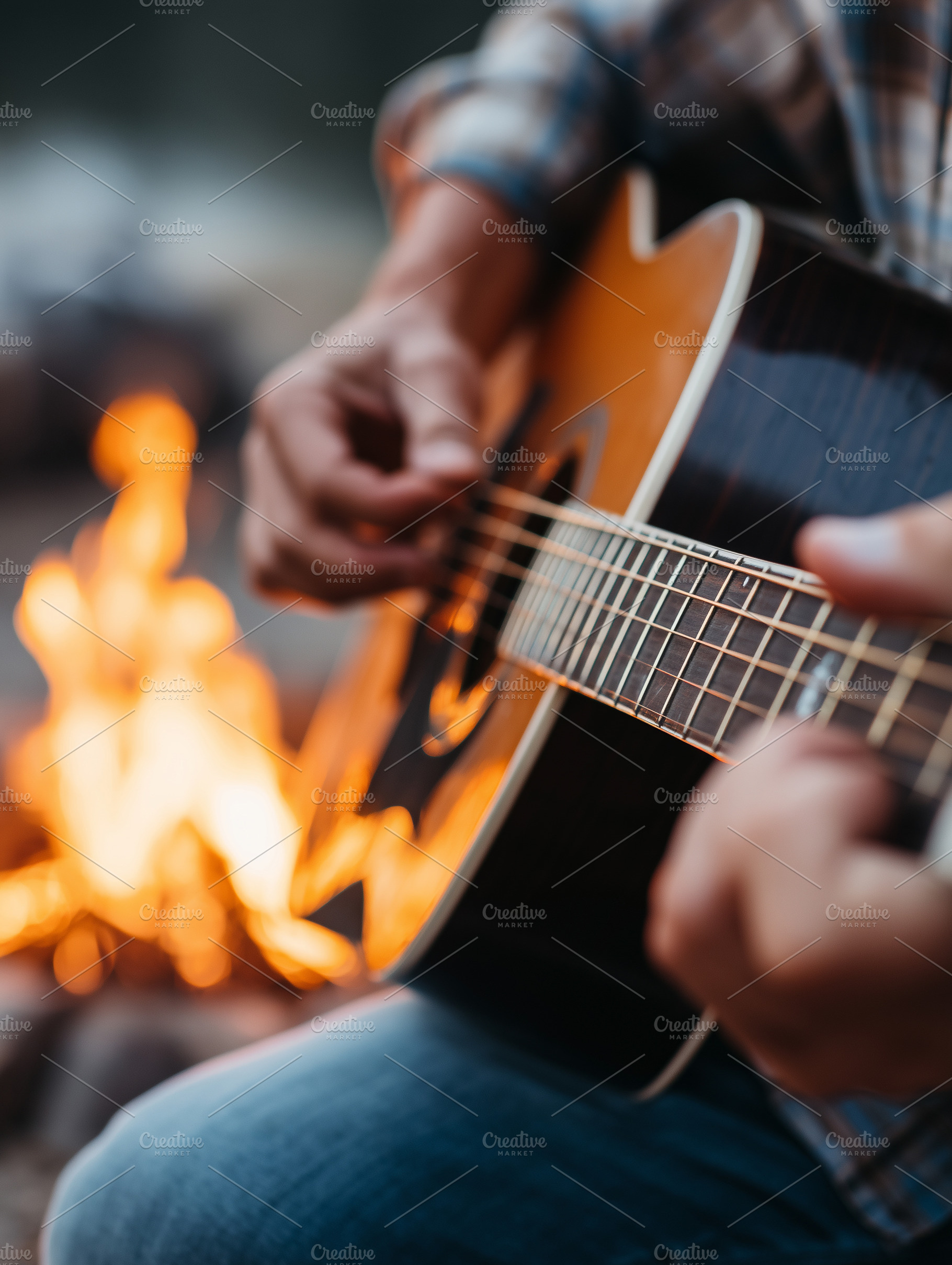 Close up of a man playing on guitar, a Person Photo by MistyDay