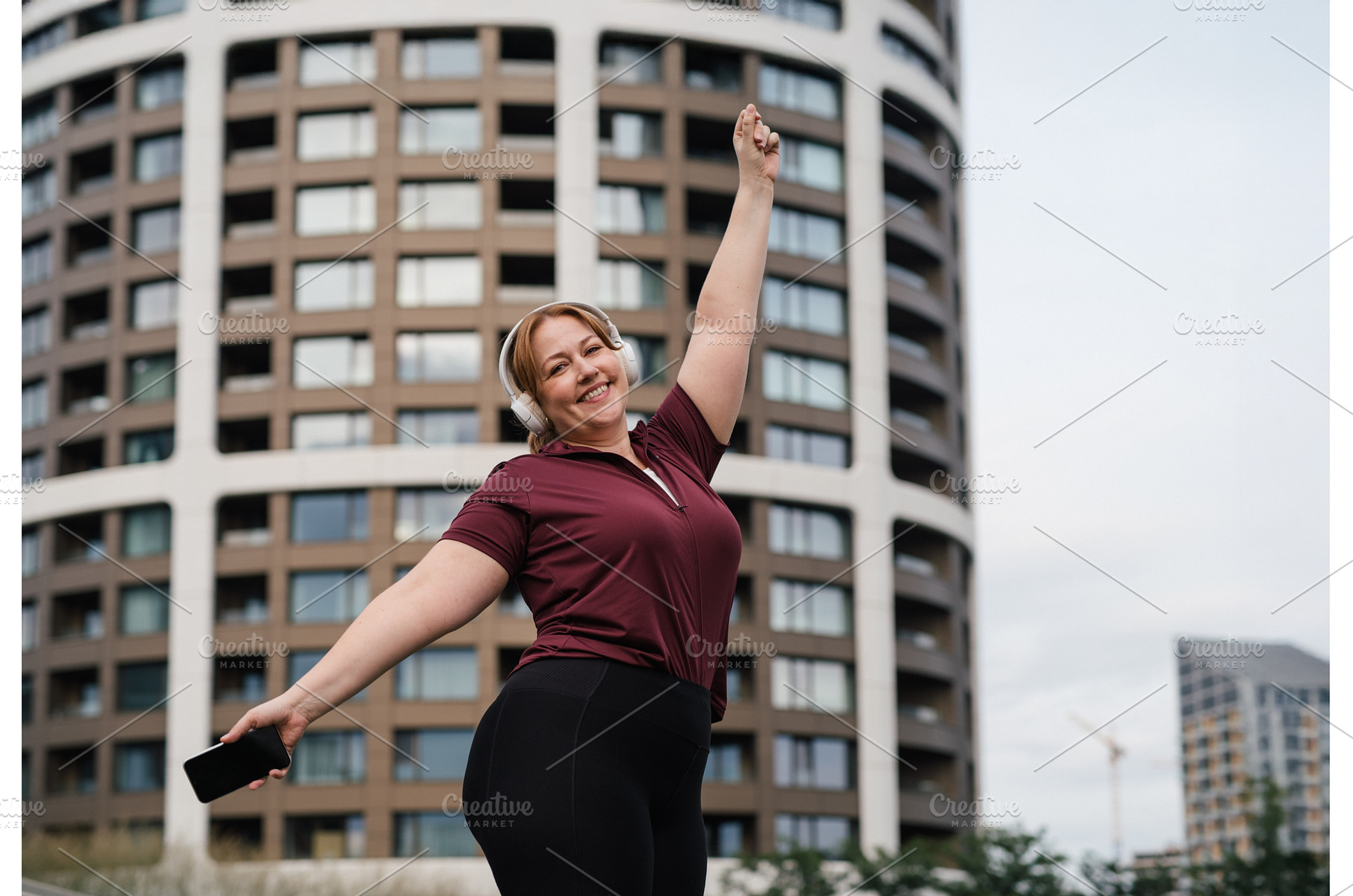 Body positive woman warming up, a Sports & Recreation Photo by HalfPoint