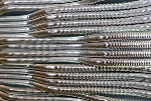 Corrugated stainless metal tubes featuring corrugated, metal, and tube
