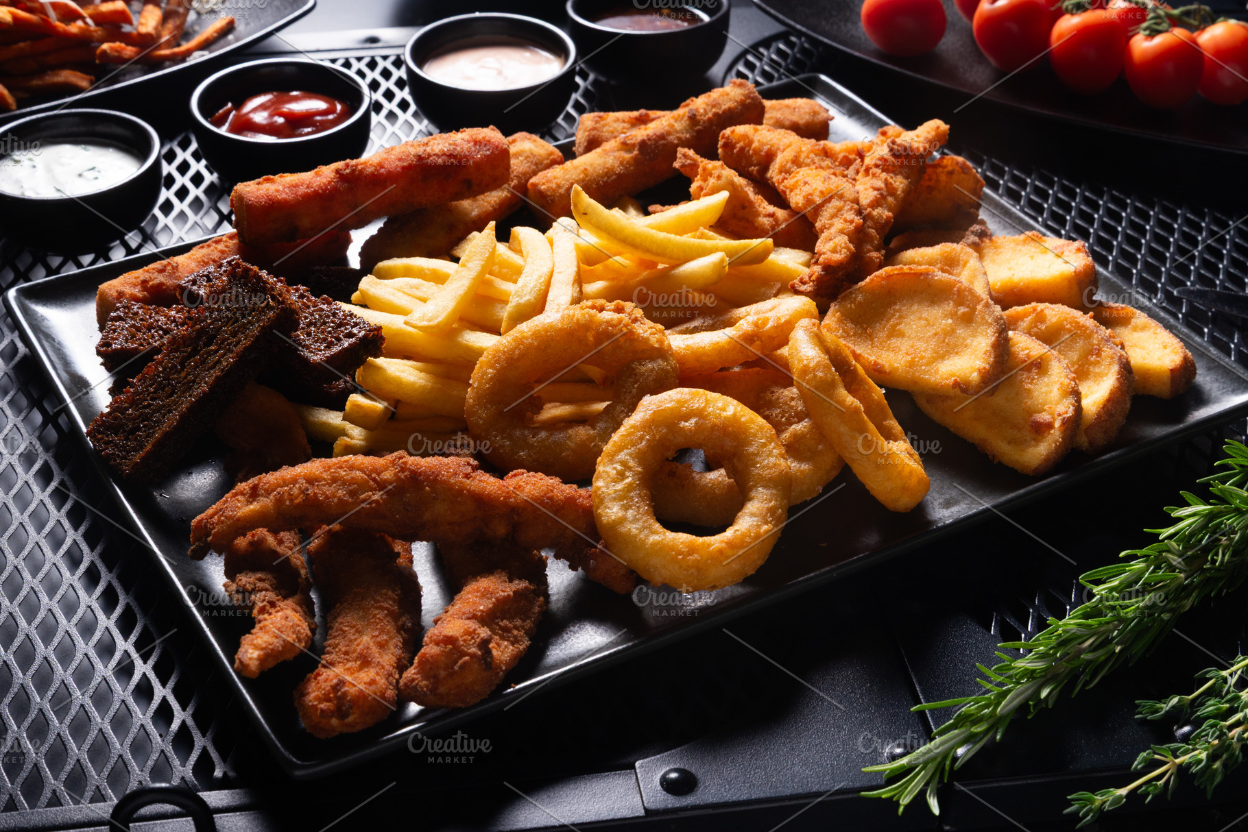 Assorted Deep Fried Snacks on Large Plate, Top View, a Photo by MDBildes