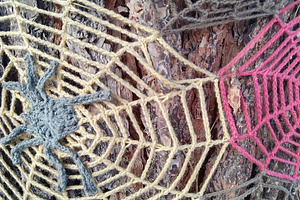Handcrafted wool spider web installation, an Abstract Photo by DanFLCreativo