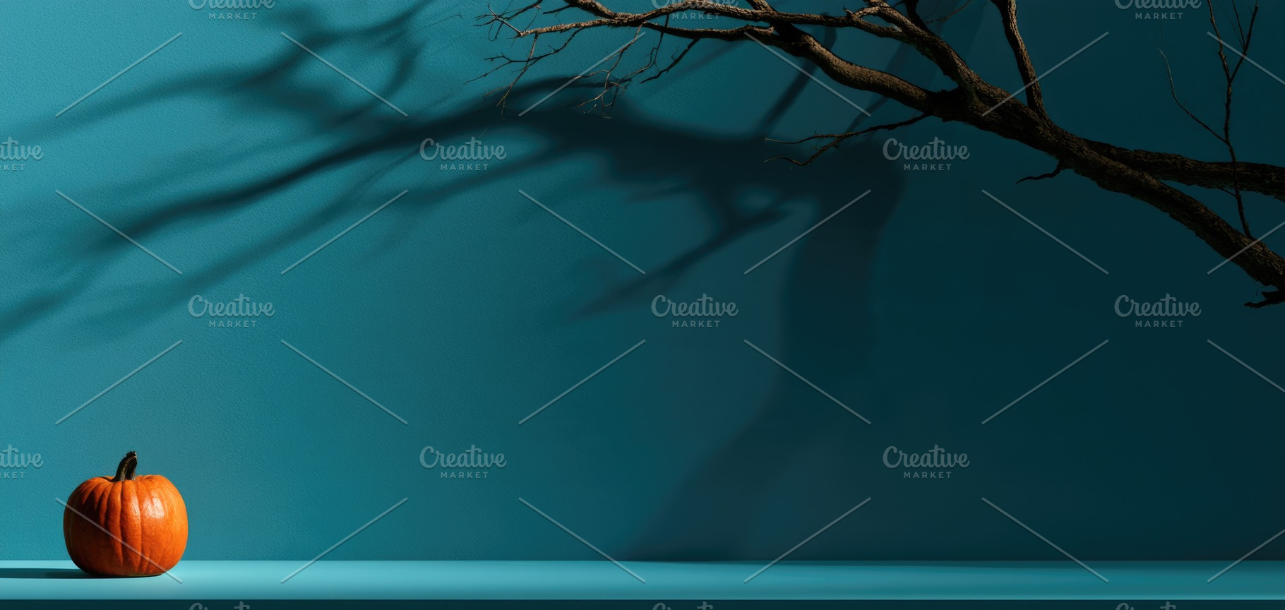 Minimal Halloween pumpkin with eerie tree shadow on teal backgro, a Person Photo by José Manuel Gelpi