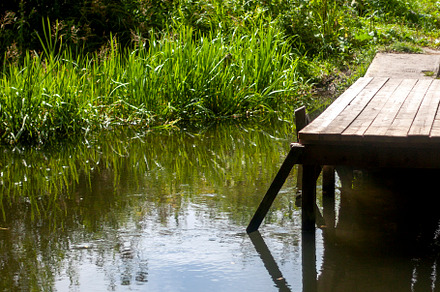 View of the pier by the river, a Nature Photo by Schreibikus