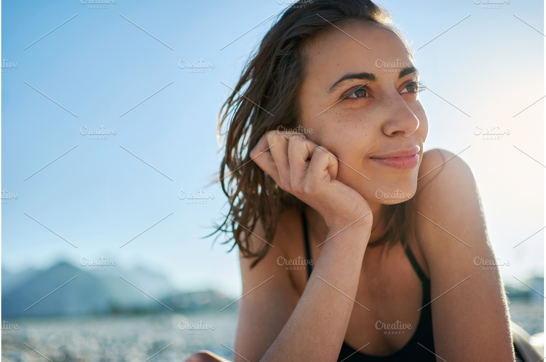 Close up face of woman at beach, a Person Photo by vitaliymateha photography