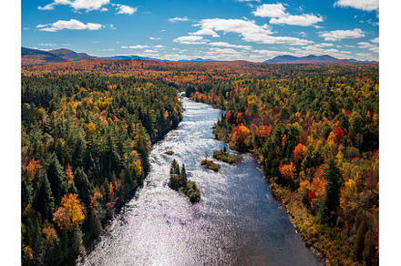 Saranac river flows through multi, a Nature Photo by Backyard Stock