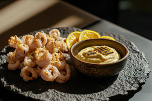 Crispy Calamari Served with Sauces, a Food & Drink Photo by Virgo Studio