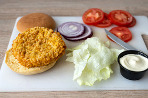 Chicken burger ingredients on cutting board, a Food & Drink Photo by etorres69