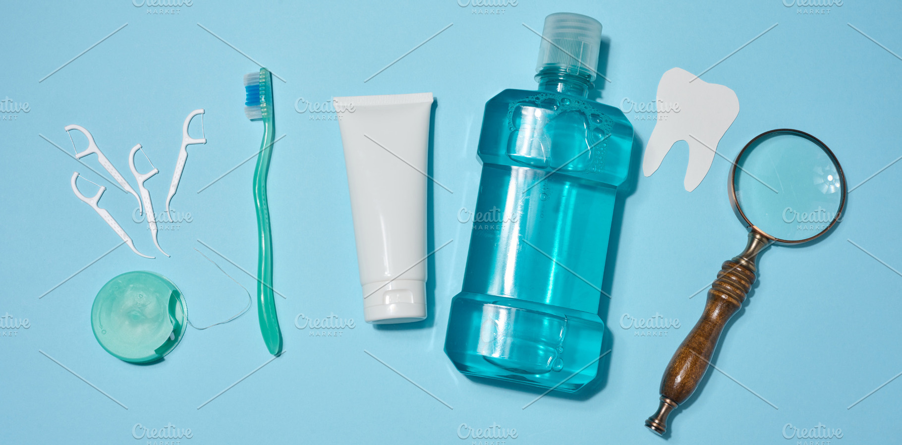 A set of oral hygiene products and items including a toothbrush,, a Health & Medical Photo by ndanko