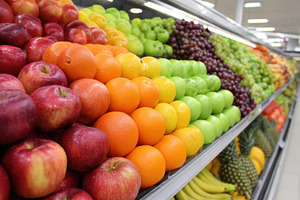 Colorful fresh fruits display in supermarket, a Food & Drink Photo by AlyaAnd