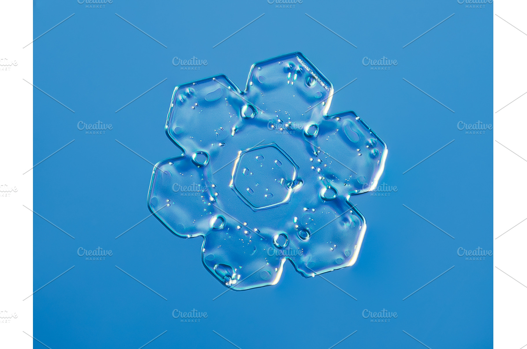 Natural snowflake crystal in blue, a Nature Photo by Lukas Jonaitis SHOP