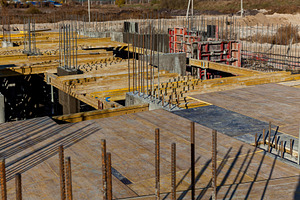 construction site with reinforced concrete structures, an Industrial Photo by Photostock