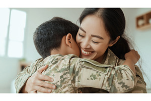 Asian female soldier warmly embraces, a Person Photo by Sergey Kotenev
