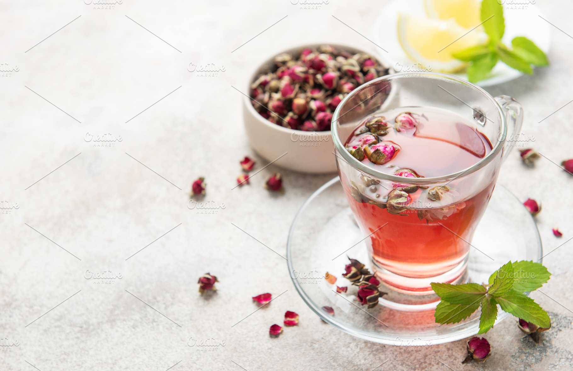 Pink rose herbal tea with dried buds and mint, a Food & Drink Photo by Olena Rudo