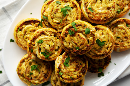 Homemade Chicken Pesto Pinwheels on a Plate, top view. Flat lay,, a Food & Drink Photo by LiudmylaChuhunova