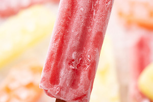 Hand holding red popsicle, a Food & Drink Photo by etorres69
