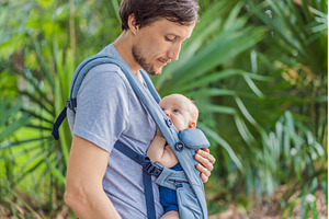 Young father walks in nature with, a Person Photo by Elizaveta Galitskaya