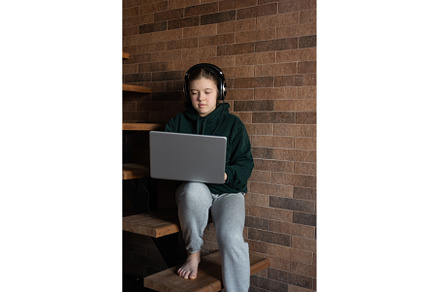 Teenager girl with laptop in, a School & Education Photo by MAnuta