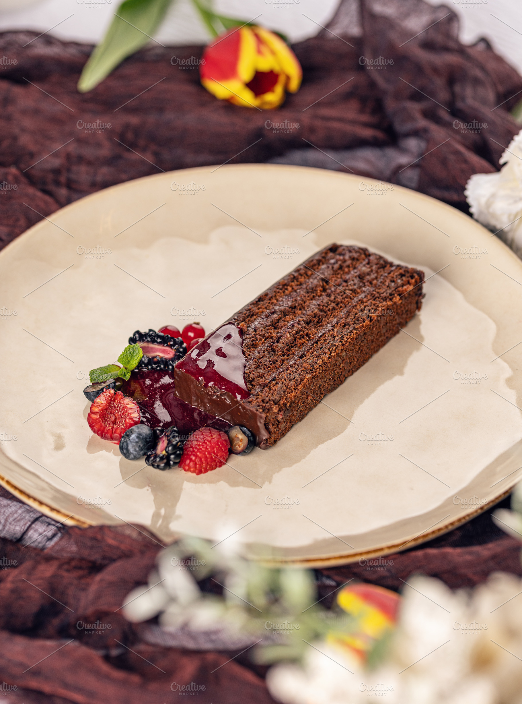 Delicious chocolate cake slice, a Photo by Grafvision photography