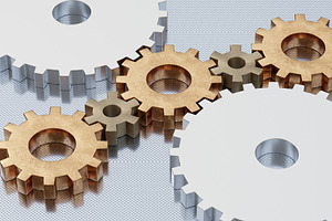 Interlocking metal gears on reflective industrial surface, an Industrial Photo by RF Images