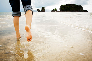 Woman Beach Walking, a Person Photo by THP Creative