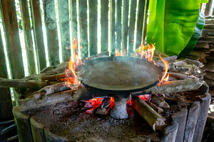Cooking Cassava Cake in Siona Village, Cuyabeno, amazonia, Ecuad, a Food & Drink Photo by GoodGoods