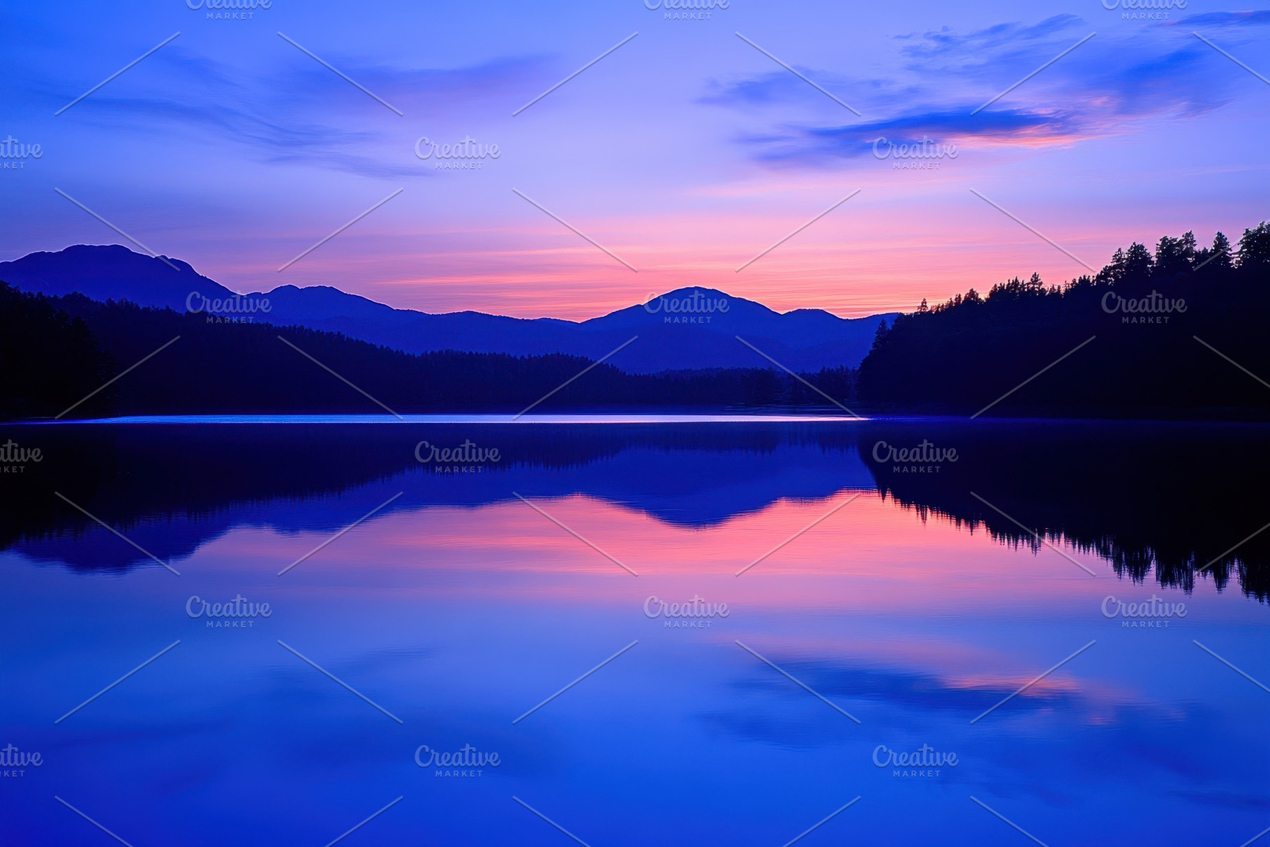 Twilight hues illuminate calm lake s, a Photo by Iftikhar Alam
